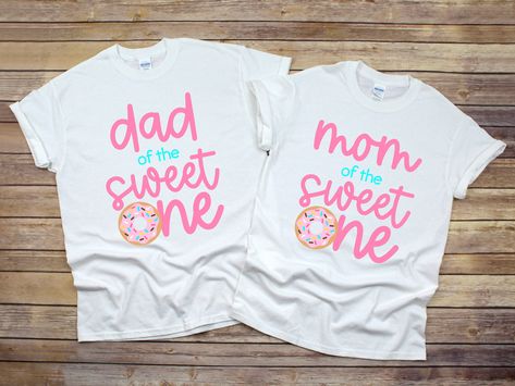 Mom and Dad of the Sweet One Shirts I use a commercial grade Direct-to-Garment printer, so the design is printed directly onto the garment. The ink is safe, eco-friendly, and CPSIA regulated. This is not an iron-on vinyl transfer as shown on other items in my shop. A Direct-to-Garment printer allows for beautifully detailed and intricate designs and colors. Please wash all garments with like colors, inside-out and on low settings. Some shrinking is possible after washing, so if your little one i Donut Birthday Shirt, Donut Shirt, Fabric Tutu, Winter Wonderland Birthday, Donut Birthday, Boho Baby Girl, Matching Mom, Donut Party, Vinyl Transfer