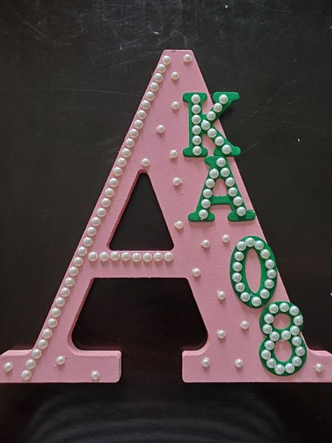 Aka Paddle, Aka Paddle Ideas, Aka Crossing Gifts, Sorority Gifts Diy, Pearl Sorority Letters, Sorority Crafts Letters, Alpha Kappa Alpha Crafts, Sigma Kappa Letters Painted, Kappa Delta Letters Painted