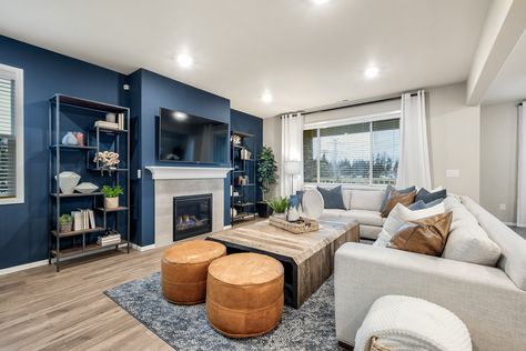 Blue And Gray Living Room Walls, Blue Living Room Aesthetics, Accent Blue Wall Living Room, Grey Blue Accent Wall Living Room, Blue Wall Family Room, Blue Living Room And Kitchen, One Blue Wall Living Room, Blue Accent Walls Living Room, Open Concept Kitchen Living Room Blue Cabinets