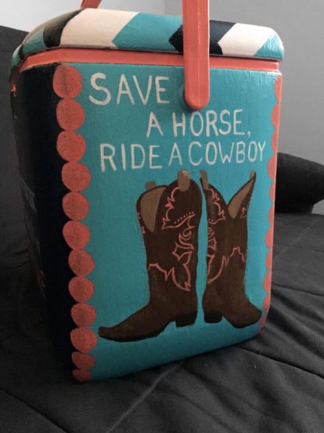 Save a horse, ride a cowboy #kappabetagamma #loveinkappa #sorority #crafts #sororitycrafts #kappa #beta #gamma #big #little #biglittlereveal #bidday #sister #kbg #greek #cooler #country #summertime #countrymusic #countrycrafts #TSM Country Frat Cooler, Sorority Coolers Painted, Sorority Cooler Ideas, Playlist Covers Pink, Painted Ice Chest, Cooler Painting Ideas, Pike Cooler, Music Playlist Covers, Painted Fraternity Coolers