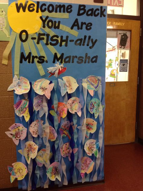 Welcome back poster for a teacher returning from getting married. Blue paper, streamers for water, yellow cardstock for sun, letters from Staples. Have each student decorate a fish. Welcome back to SCHOOL you are now o-FISH-ally Mrs. ----- Wedding Gifts For Teachers From Students, Teacher Wedding Gift From Students, Teacher Bridal Shower From Students, My Teacher Is Getting Married, Teacher Wedding Shower From Students, School Wedding Shower For Teacher, School Bridal Shower For Teacher, Teacher Getting Married Student Gift, Classroom Bridal Shower For Teacher