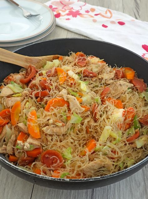 Pancit Guisado made with bihon noodles, meat, seafood, and vegetables. Traditionally served for everyday dinners as well as special occasions, this Filipino noodle dish is hearty, tasty, and sure to be a crowd favorite. Bihon Noodles, Pancit Guisado, Bihon Guisado, Filipino Dinner, Guisado Recipe, Phillipino Food, Pancit Bihon, Shrimp And Veggies, Pancit Recipe