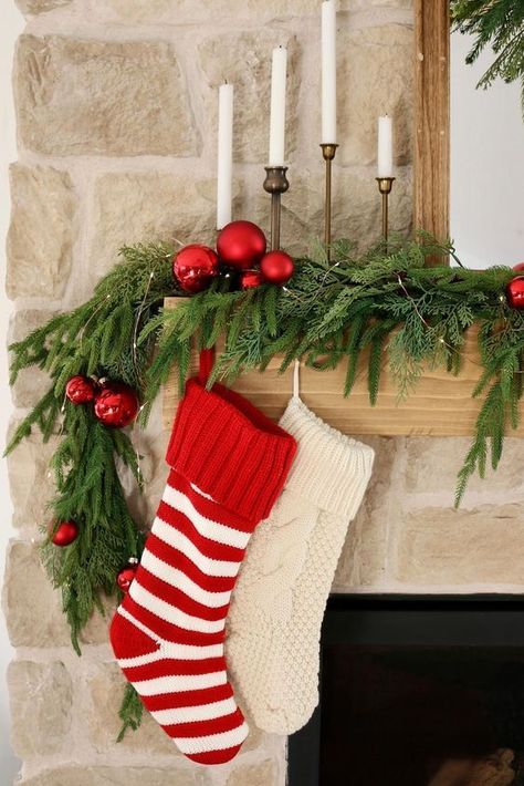 The Christmas season is here and it's time to deck the halls. We have rounded up some of our favourite Christmas & holiday mantles. Mantel decor, mantel decorating ideas, mantle Christmas decor ideas, mantel, Christmas decor ideas garland, Christmas stockings, Christmas wreath, Christmas garland. Christmas fireplace inspiration like farmhouse, country, rustic, elegant, with television tv, and more. DIY on how to style your mantel for your living room, bedroom, or any room. Christmas Decor Ideas Garland, Christmas Decor Ideas Mantel, Mantle Christmas Decor Ideas, Mantel Christmas Decor, Mantle Christmas Decor, Country Girl Home, Mantle Christmas, Mantel Christmas, Fireplace Inspiration