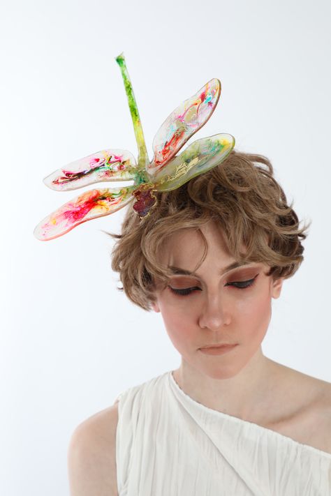 Transparent innovative materials mix with abstract colours in this flying dragonfly headpiece by British milliner and designer SHANDANA. Dragonfly Headpiece, Dragonfly Costume, Flying Dragonfly, Costumes 2024, Elevated Fashion, Innovative Materials, Head Piece, Headpiece, Hats