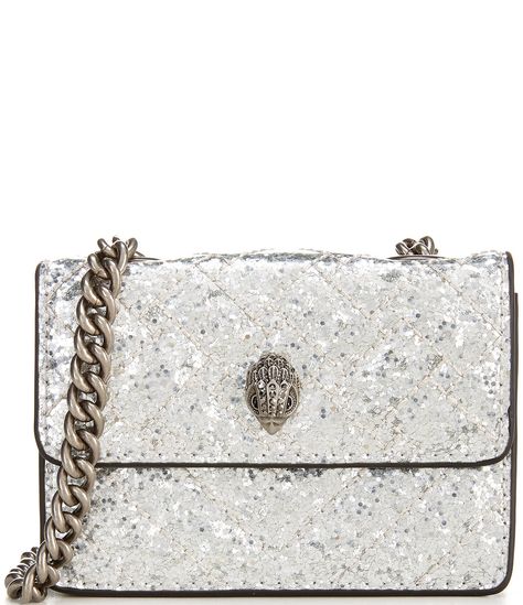 From Kurt Geiger London, the Micro Metallic Sequin Crossbody Bag features:Polyester/PVC/PETPolyester liningOne interior compartmentAntique silver hardwareSnap closureApprox. 4.33'' W x 2.76'' H x 0.98'' D; strap drop 23.62"Imported. Silver Kurt Geiger Bag, Kurt Geiger Bag Mini, Mini Kurt Geiger Bag, Kurt Ginger, Micro Kurt Geiger, Micro Kensington Bag, Kurt Bag, Bolsas Kurt Geiger, Kurt Geiger Bag