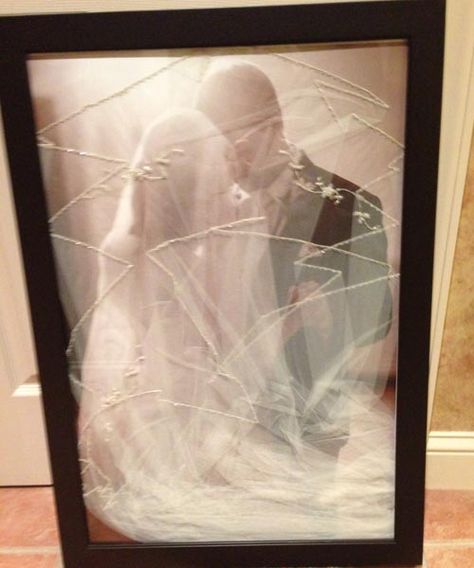 Use your veil to transform your favorite wedding photo into an ethereal piece of art. Wedding Veil Pictures, Veil Pictures, Wedding Dress Keepsake, Diy Wedding Veil, Dress Preservation, Keepsake Ideas, Wedding Dress Preservation, Wedding Shadow Box, Wedding Picture