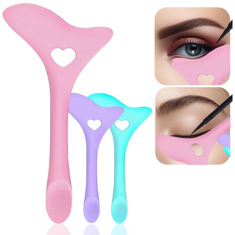 PRICES MAY VARY. High Quality Eyeliner Tool: This silicone eyeliner tool is made of high-quality silicone that is easy to clean by just wiping with tissue after use or wash with water. It is soft and elastic that makes your eye makeup application easy, equal and quick. Multifunctional Eye Makeup Tool: Eyeliner stencils tool helps to avoid smudging your eye makeup. It can be use for mascara shield so that the product won't strike or hit your under eyes. This Eyeliner tool can be also used as a li Mascara Drawing, Drawing Lipstick, Winged Eyeliner Stencil, Eyeliner Tool, Mascara Shield, Eyeliner Guide, Fragrance Free Makeup, Draw Eyeliner, Powdered Eyeliner