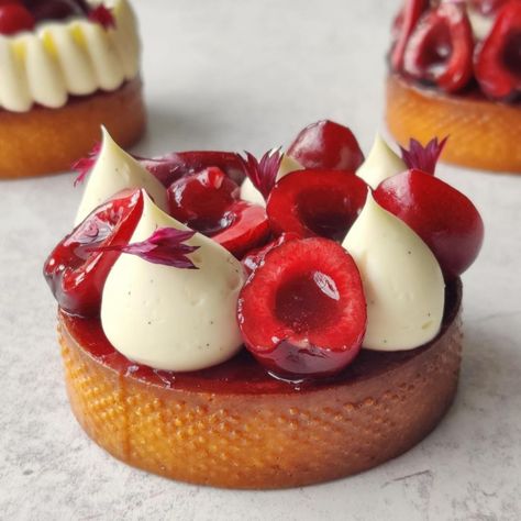 Indulge in a symphony of sweet and tart with this stunning Cherry/Vanilla Tartlet by @vladimir_baudelin 💖 It features a buttery pate sucree crust filled with a luxurious almond and cherry cream, cherry and vanilla confit, and vanilla whipped ganache 🥰 It is topped with fresh cherries for the perfect finishing touch. Bravo chef! 👏 Thanks for tagging us to see and share 🙌 Modern Pastry, Whipped Ganache, Cherry Vanilla, Baking Inspiration, Fresh Cherries, Food Inspo, Tart, Pastry, Almond