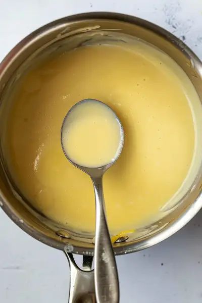 Discover the joy of making Creamy Lemon Butter Sauce with this simple recipe. It combines wine, cream, and lemon for a luscious and zesty sauce. Ideal for pairing with grilled chicken, fish, pasta, and vegetables. Try it now and transform your meals! Butter Cream Sauce For Fish, Lemon Cream Sauce For Fish, Lemon Sauce For Pasta, Lemon Butter Sauce For Fish, Creamy Sauce For Fish, Creamy Lemon Butter Sauce, Pasta And Vegetables, Butter Cream Sauce, Lemon Cream Sauce