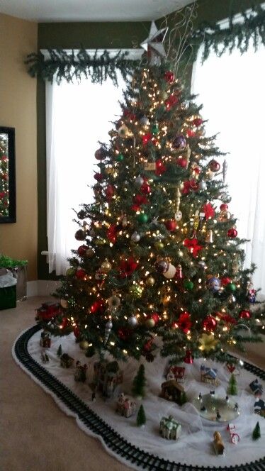 Christmas Tree With Train Set, Christmas Train Display Under Tree, Underneath Christmas Tree Ideas, Christmas Tree Train Ideas, Train Village, Christmas Tree Train, Classy Christmas, Christmas Train, Tree Ideas