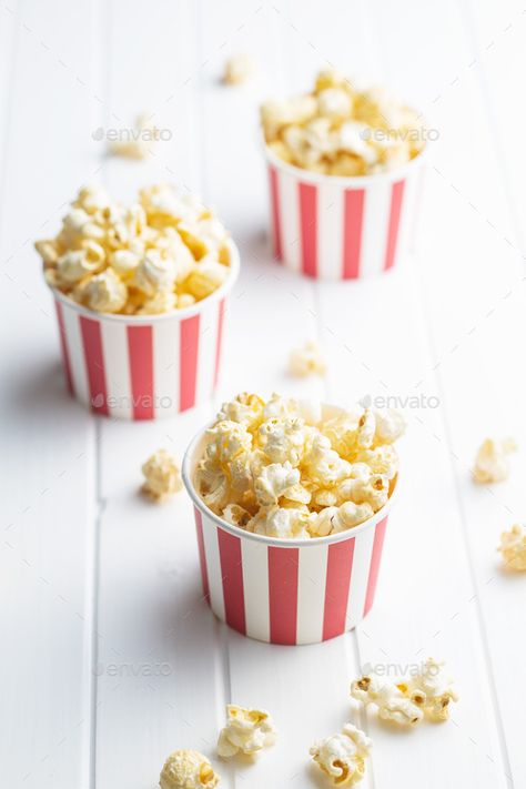 Sweet tasty popcorn in striped paper cup. by jirkaejc. Sweet tasty popcorn in striped paper cup on white table. #Sponsored #popcorn, #striped, #Sweet, #tasty Popcorn Cups Party, Packaging Graphics, Popcorn Cups, Chili Cookoff, Curious George Birthday, Popcorn Snacks, Colorful Birthday Party, Simple Birthday Decorations, Popcorn Party