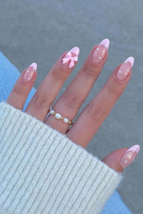 Step into elegant sophistication with these Baby Pink Stiletto Nails adorned with pearls and an adorable bow detail. Click through to explore the entire collection filled with understated chic designs that will add a feminine flair to your style ✨🎀 // Photo Credit: Instagram @naileditbeauty Baby Pink Stiletto Nails, Coquette Nail Designs, Coquette Nail, Pink Stiletto Nails, Coquette Nails, Valentine Nail, Baby Pink Nails, Nail Acrylic, Romantic Nails