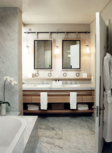 a) the way the mirrors are hung b) the ledge above the counter and c) the long towel bar that runs across the front of the sink console Powder Room Modern, Lodge Bathroom, Condo Design, Modern Baths, Bathroom Spa, Modern Shower, Bathroom Renos, Dream Bathroom, Hotel Design