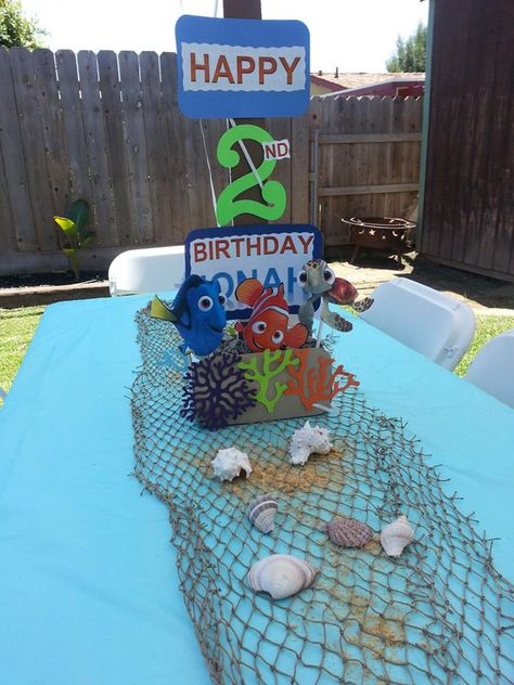 Only instead it will say welcome baby Finding Nemo Party Centerpieces, Dory Centerpieces Ideas, Finding Nemo 2nd Birthday Party Ideas, Finding Nemo Table Centerpieces, Finding Nemo Table Decorations, Nemo Table Decorations, Finding Nemo Birthday Party Ideas Centerpieces, Finding Nemo Birthday Decorations, Finding Dory Centerpieces Ideas