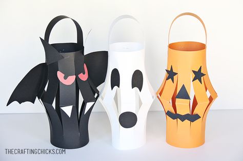 Halloween Lanterns!  Could also make one into a black cat, or a green monster or "Frankenstein" head, etc. Halloween Paper Lanterns, Halloween Decorations For Kids, Spider Crafts, Halloween Crafts For Toddlers, Halloween Paper Crafts, Fun Halloween Crafts, Halloween Arts And Crafts, Halloween Lanterns, Easy Halloween Crafts