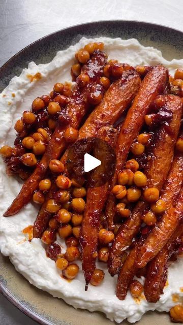 Mob on Instagram: "Follow @mob for daily recipes.

@sophiewyburd here back with one of my favourite Mob recipes of all time. Sticky carrots and crispy chickpeas, served on a big swoosh of feta yoghurt. Don’t sleep on your carrot tops - I use them to make a herby drizzle, and they add a nice flash of green to the dish too. I like this as a roast side, but it is also banging as a dish in and of itself with some breads to swipe through. Full recipe on the Mob website now, link in bio. Tune is Lou Doillon - Where To Start. Big love x #Mob" Body Flow, Carrot Tops, Veggie Ideas, Potato Pudding, Vegan Casserole, Food Salad, Veg Food, Crispy Chickpeas, Chefs Kiss