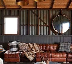 5 Ideas for Your Much-Needed Man Cave | Fat Shack Vintage Vintage Industrial Interior Design, Tufted Leather Couch, Modern Cabin Decor, Best Man Caves, Man Cave Design, Barn Houses, Leather Couch, Modern Cabin, Barn House Plans