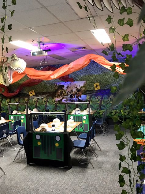 Classroom Dinosaur Theme, Jurassic Park Room Transformation, Dinosaur Vacation Bible School, Jurassic Park Classroom Transformation, Dinosaur Classroom Transformation, Stompers And Chompers Vbs 2023, Park Theme Classroom, Jurassic Park Classroom, Dinosaur Classroom Theme Decor