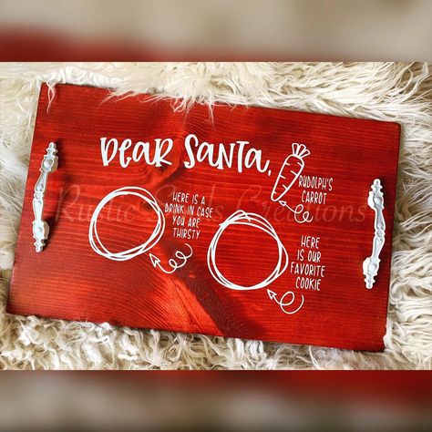 Dear Santa Tray with white handles $40 #DearSanta #CarrotsForRudolph #MilkForSanta #SantaTray #MerryChristmas #HappyHolidays #ChristmasDecor #CustomChristmasDecor #CustomSantaTray #VinylsByLena #RusticSoulsCreations #FindUsOnFacebook #FindUsOnEtsy #FindUsOnPinterest #WeTakeCustomOrders Dear Santa Tray, Santa Cookie Tray, Santa Tray, Santa Snacks, Wood Santa, Snack Trays, White Handles, Santa Cookie, Cookies And Milk