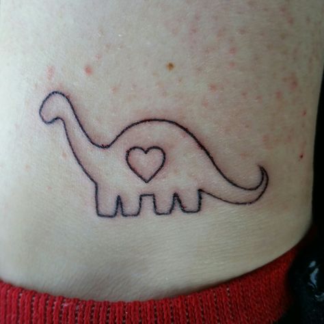 Dinosaur Tattoo For Daughter, Tiny Dinosaur Tattoo, Stethoscope Tattoo, Dinosaur Tattoo, Charm Tattoo, Tiny Dinosaur, Dinosaur Tattoos, Dove Tattoo, Tattoo Love