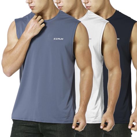 PRICES MAY VARY. 90% Polyester / 10% Spandex 4-way stretch construction moves better in every direction. Lightweight, sweat-wicking fabric to help keep you comfortable and moving freely. Sleeveless design helps move your arms freely and work out comfortably.great for workout,running,gym or home fitness. High-tech and stretchy fabric make this shirt well ventilated and give your skin the room to breath. For your reference, model is 6'1" with 38 chest and wears a medium size. EZRUN Men's Performan Sleeveless T Shirt Men, Fitness Fits, Gym Wear Men, Gym Muscle, Beach Tanks Tops, Beach Tanks, Mens Athletic Wear, Swim Shirt, Gym Fashion