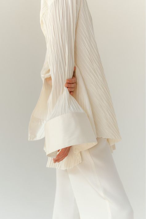 Oversize pleated shirt in mid-weight stretch crepe. Details include collar, covered button placket and oversize cuffs. Wear it with Genevieve Pants or denim. Shirt Cuffs Design, Pleated Top Outfit, Italian Aesthetic Fashion, Pleats Shirt, Pleated Pattern, Pleats Pattern, Textured Shirt, Modesty Outfits, Pleated Shirt