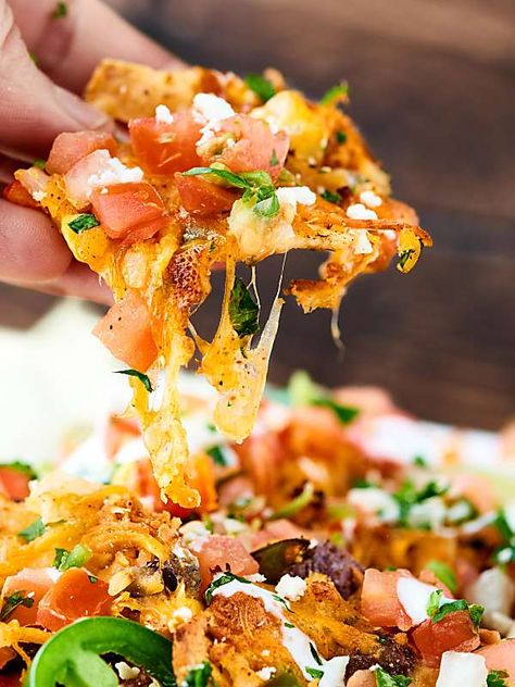 These Loaded Chicken Nachos have 12 layers! and are full of tender veggies, flavorful chicken, beans, corn, and TONS of cheese. Surprisingly quick, easy and delicious! showmetheyummy.com Loaded Chicken Nachos Recipe, Loaded Chicken Nachos, Shrimp Nachos, Steak Nachos, Chicken Beans, Beef Nachos, Steak Shrimp, Chicken Nachos Recipe, Loaded Chicken