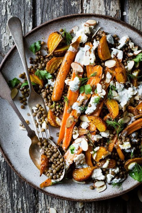 In this Roasted Beet & Carrot Lentil Salad, warm lentils topped with roasted vegetables get a boost from herbed yogurt sauce, feta, and crunchy almonds. Bojon Gourmet, Salad With Feta, Lentil Salad, Spring Vegetables, Roasted Beets, Macaroni Salad, Tortellini, Roasted Vegetables, Couscous