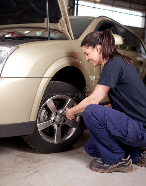 Woman Mechanic Tire Change. A woman mechanic loosening nuts on a wheel for a tir #Sponsored , #sponsored, #advertisement, #Tire, #Woman, #woman, #Change Mechanics Aesthetic, Woman Mechanic, Mechanic Shop, Smile Images, Tire Change, Future Jobs, Social Media Games, Change Image, Tyre Shop