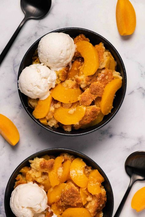 This is by far the best vegan peach cobbler. Made with juicy ripe peaches and a buttery biscuit topping this is the ultimate summer dessert. #vegan #dairyfree | lovingitvegan.com Vegan Peach Cobbler, Vegan Recipes For One, Vegan Apple Crisp, Southern Peach Cobbler, Best Vegan Cheese, Vegan Peach, Vegan Summer Recipes, Dessert Vegan, Vegan Whipped Cream