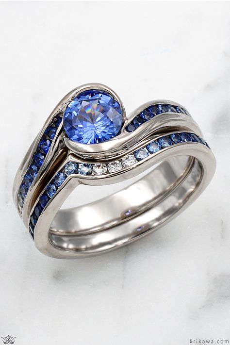 This Carved Wave Engagement Ring is set with a blue sapphire and is paired with a Diamond Channel Contoured band. Wave Ring, Bridal Set, Blue Diamond, Bridal Sets, Beautiful Things, Beach Wedding, Blue Sapphire, Band Rings, Engagement Ring