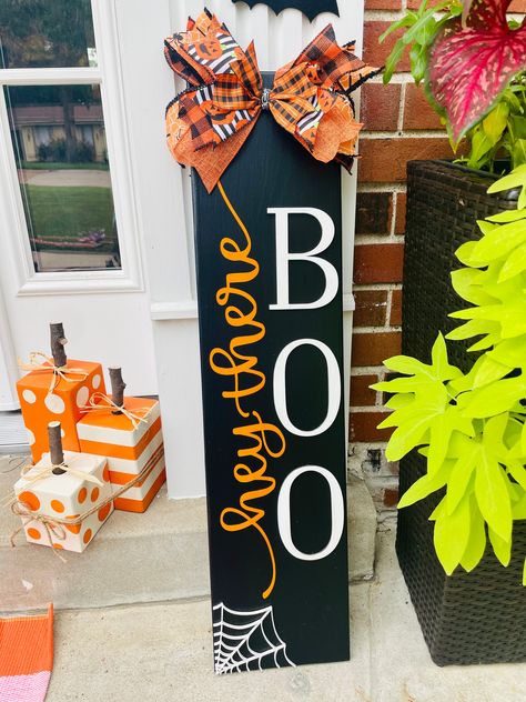 We are so excited to be offering more porch signs! The BOO and spiderweb are both made out of raised wood and so beautiful in person. This is the perfect sign to add to your Halloween porch décor amongst hay bails, pumpkins and mums. We can see it now! Sizing: 30" tall and 7.25" wide. Because this item is a sign and made from wood, it is heavy. We only offer local pickup in Ballwin or Oakville for this item. So, please do not select shipping for this item or it will be cancelled and refunded. Boo Welcome Sign, Fence Posts Crafts, Front Porch Signs Wooden Diy Halloween, Black Porch Leaner, Porch Boards Signs Diy Fall, Pumpkin Board Signs, Thanksgiving Front Porch Sign, Fall Wood Projects Front Porch, Tall Halloween Sign