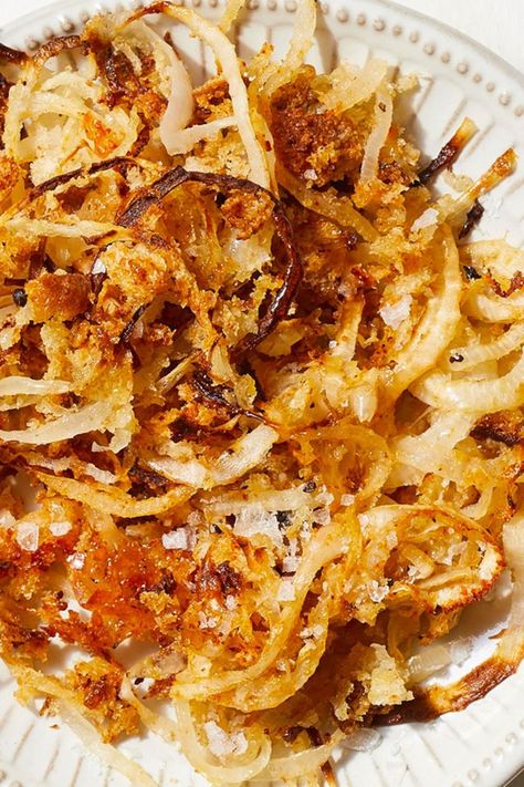 You may not have considered onions as candidates for the spiralizer, but you should. They create beautiful ribbons that make this recipe reminiscent of fried shoestring onions. And because this onion ring-inspired recipe is baked rather than fried, they're really easy to make. Serve them as a side with burgers or as a crunchy healthy snack for game night. #healthysnacks #snacks #snackideas #healthysnackrecipes #healthysnackideas #healthyrecipes Parmesan Crusted Cod, Shallot Recipes, Healthy Potato, Savory Sides, Recipes Vegetables, Spiralizer Recipes, Quick Chicken, Parmesan Crusted, Onion Recipes