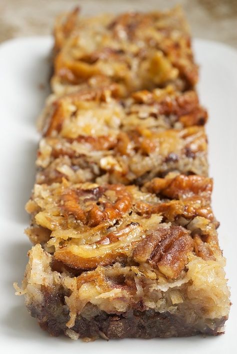 German Chocolate Pecan Pie Bars - Recipe adapted from Southern Living, September 2012. _ In this case, nostalgic flavors are baked into pecan pie bars. These are, without a doubt, the best pecan pie bars I’ve ever made! German Chocolate Pecan Pie Bars, German Chocolate Pecan Pie, Chocolate Pecan Pie Bars, Chocolate Pecan Pie, Pecan Pie Bars, Pie Bars, Pie Bar, Chocolate Pecan, German Chocolate