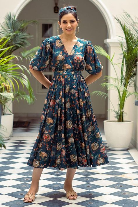 Buy #teal wrap style dress with #floral printed motifs by #RivaajClothing at #AzaFashions Shop online now at #Azafashions.com Call +91 8291990059 or email contactus@azafashions.com for enquiries. #wedding #festive #ethnic #tradional #shopping #shoponline #party Floral Gown Designs, Cotton Dress Pattern Indian Summer, Indian Midi Dress, Kurti Neckline, वेस्टर्न ड्रेस, Cotton Dress Pattern Indian, Indian Frocks, Frocks For Women, Cotton Dress Pattern