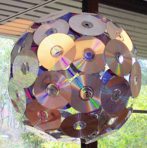 I've used CDs for something like this before. Now...to collect a bunch all over again... Rock And Roll Aesthetic Birthday, School Of Rock Theme Party, Concert Party Ideas, Rock N Roll Float Ideas, Y2k Party Decorations For Men, Music Backdrop Ideas, Glam Rock Party Decorations, Rock And Roll Theme Party Decorations, Rock N Roll Party Ideas Decor