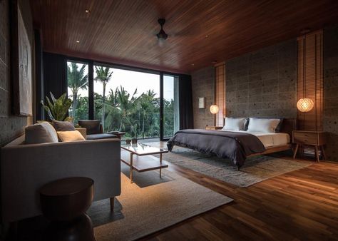 In this modern bedroom, a dark wood ceiling, as well as wood floors and wood blinds adds a sense of warmth to the room. #ModernBedroom #WoodAndGrey #BedroomDesign Alexis Dornier, Outdoor Entertaining Spaces, Koh Phangan, Lighting Trends, Baguio, Reclaimed Timber, River House, Architect House, Villa Design