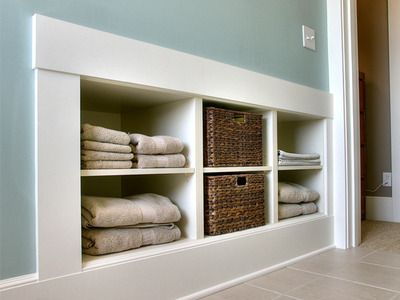 Go Into the Wall    For extra storage, consider building recessed shelves into a wall. You may only be able to go a few inches deep, but it may be adequate enough to hold towels, detergents and laundry supplies. Laundry Room Storage Shelves, Recessed Shelves, Room Storage Diy, Casa Country, Attic Bedroom, Laundry Room Storage, Shelf Storage, Trendy Bathroom, Laundry Room Design