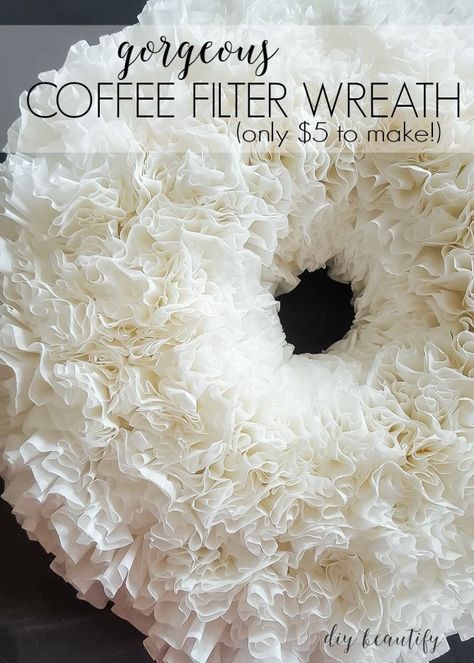 DIY Winter wreath made out of coffee filters! You'll find the complete tutorial, step by step, at diy beautify! Coffee Filter Paper Wreath, How To Make A Coffee Filter Wreath, Coffee Filter Wreath Diy How To Make, Diy White Christmas Wreath, White Door Decoration Ideas, Diy White Wreath, White Christmas Wreaths Diy, White Wreath Diy, How To Make A Wreath