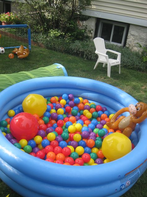 Need an easy activity for the kiddies? Fill your kid pool with plastic balls for a ball pit! Major hit with the toddlers! Kiddie Pool Ball Pit, Home Ball Pit Ideas, Ball Pit Birthday Party Ideas, Diy Outdoor Ball Pit, Ball Pit Themed Birthday Party, Inflatable Pool Ball Pit, Park Toddler Birthday Party, Toddler Pool Party, Outdoor Ball Pit