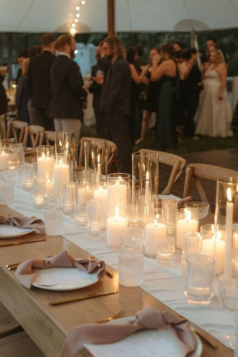 Nothing sets the mood quite like a candle-lit wedding tablescape! 🕯️✨ Who else loves the romantic glow?  📸: IG/bad_boss_bride Bridal Table Candles And Flowers, Candle Only Tablescape, Outdoor Candle Lit Dinner, Romantic Wedding Dinner Table, Candle Reception Table Decor, Tablescape Candles Wedding, Candle Lit Tablescape, Pillar Candles Head Table Wedding, Wedding Candle Aesthetic