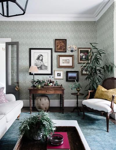 Pale Green Walls, Vibey Rooms, Cosy Living Room, Gorgeous Interiors, Green Paint Colors, Green Walls, Green Interiors, Upholstered Ottoman, Hanging Pictures