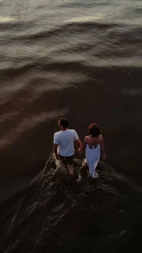 Drone Footage of a Couple Holding Hands while Walking in Shallow Water · Free Stock Video Couple Holding Hands While Walking, Holding Hands While Walking, A Couple Holding Hands, Couple Holding Hands, Drone Footage, Shallow Water, Video Setting, Successful Relationships, Free Stock Video