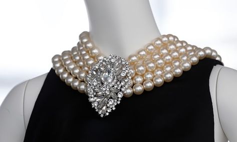 The black satin sheath with integral pearl necklace worn by Audrey Hepburn in the film Breakfast at Tiffany’s. Audrey Hepburn Photos, Wallis Simpson, Tiffany Necklace, Breakfast At Tiffany's, 20th Century Fashion, Tiffany Jewelry, Breakfast At Tiffanys, Fashion Plates, Audrey Hepburn