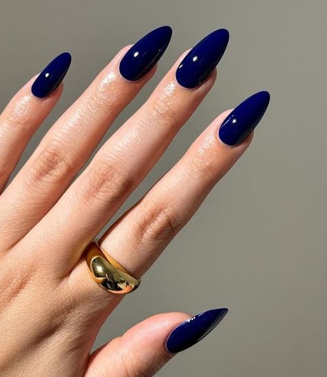 Dark Blue Nails Almond Shape, Deep Royal Blue Nails, Winter Almond Nails Designs, Glossy Blue Nails, Dark Blue Stiletto Nails, Blue Nails With Pearls, Almond Nails Designs Blue, Royal Blue Almond Nails, Dark Blue Winter Nails