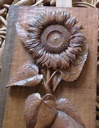 Zarir wood arts carved sunflower Sunflower Carved In Wood, Sunflower Wood Carving, Ornate Books, Sunflower Stencil, Carved Flowers, Stencil Wood, Cultural Crafts, Dremel Wood Carving, Clay Wall Art