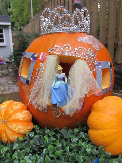 Fall Decorations & Fall Decorating Ideas - CINDERELLA PUMPKIN - No fairy godmother necessary for this fun D.I.Y. Create your very own sparkly princess carriage with some glue, bedazzling jewels, and carving knives. Get the how-to at Redbookmag.com. Easy Pumpkin Decorating, Pumkin Decoration, Princess Pumpkin, Pumpkin Decorating Ideas, Dekorasi Halloween, Disney Pumpkin, Halloween Princess, Cinderella Pumpkin, Pumpkin Contest