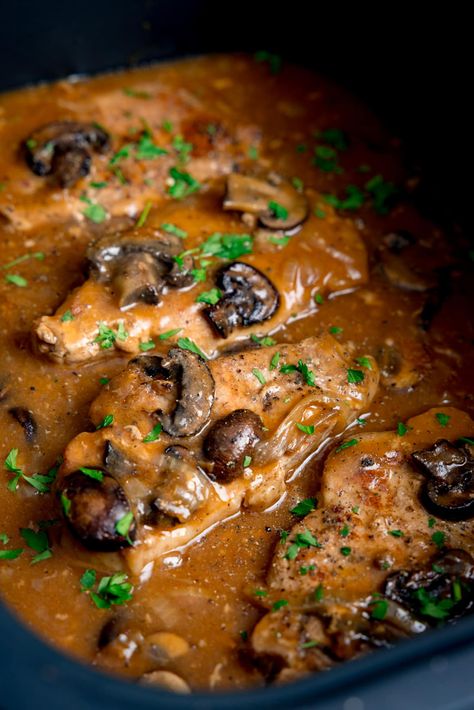 This is a lovely tender pork dish with lots of mushrooms and plenty of sauce. The pork steaks melt in the mouth after a long, slow cook in the crockpot. Serve over mashed potato or alongside a baked potato for the best comfort food dinner. Slow Cooker Pork And Mushrooms, Slow Cooker Pork Casserole Recipes, Slow Cooker Pork Chops With Sweet Potatoes, Pork Sirloin Chops Crockpot, Pork Casserole Recipes Slow Cooker, Slow Cooker Pork Steaks, Crockpot Pork Loin Chops, Pork Chop Recipes Crockpot Slow Cooker, Crockpot Pork Chops Recipes