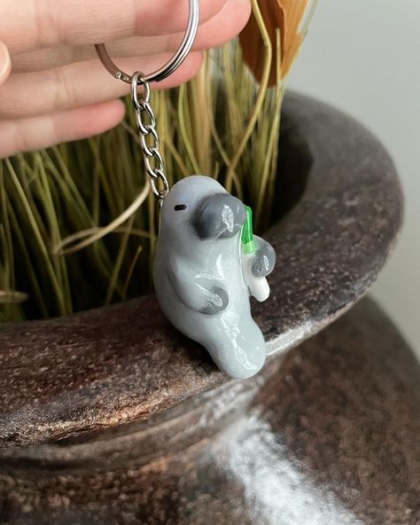 Guess what animal this is 🙈 . . . . . . #manatee #animal #totemanimal #leek #keychain #cuteanimal #polymerclay #polymerclayart #sculpey… | Instagram Polymer Clay Manatee, Clay Manatee, Manatee Jewelry, Animal Keychain, Clay Keychain, Diy Air Dry Clay, Manatees, Clay Crafts Air Dry, Clay Animals