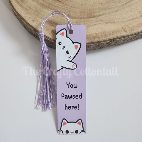 Cute kitty kawaii style bookmarks now available! Which is your favourite? 🐱🐾 #kitty #kawaiiaesthetic #bookish #booktok #cats #catlovers #reading #bookmarks #bookaccessories #calico #whitecat #blackcat Bookmark Ideas Aesthetic, Kawaii Bookmarks, Bookmark Aesthetic, Purple Bookmark, Cat Bookmark, Reading Bookmarks, School Book Covers, Diy Photo Book, Cute Bookmark